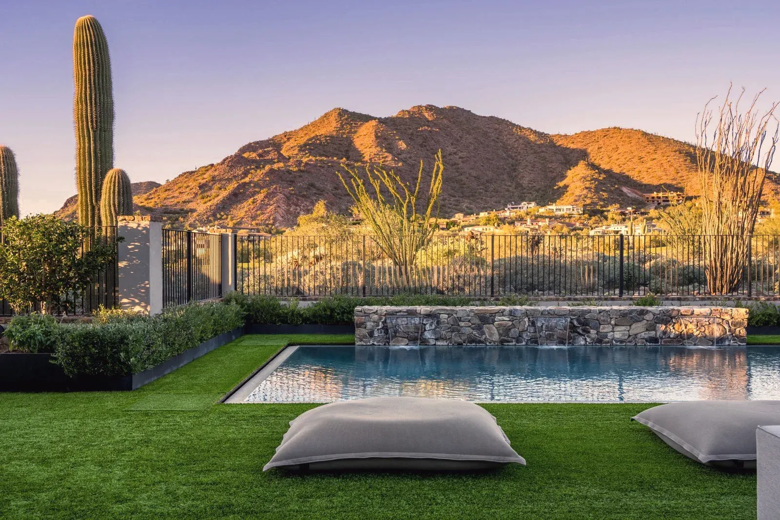 A negative-edge pool and water feature at a Silverleaf estate, Scottsdale