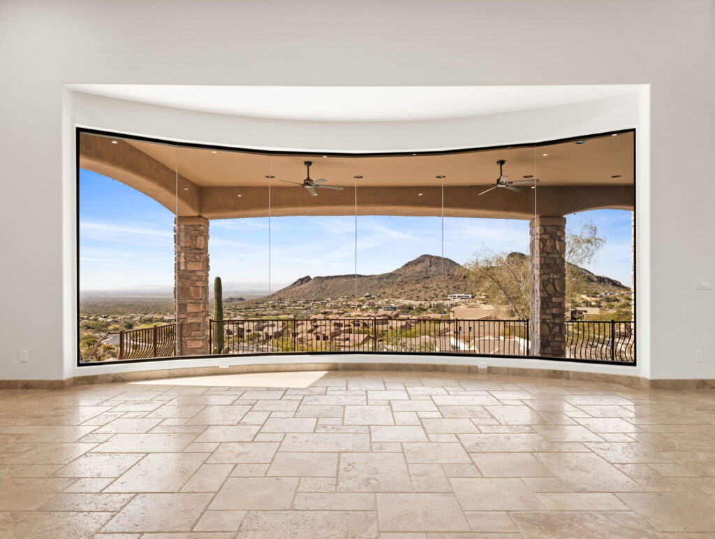 Sonoran Skyline — second-level library loft and home office with balcony overlooking living area